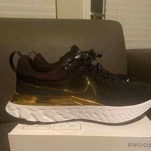Nike React Infinity Flyknit.  Black/gold metallic trim.  Personal ID on back